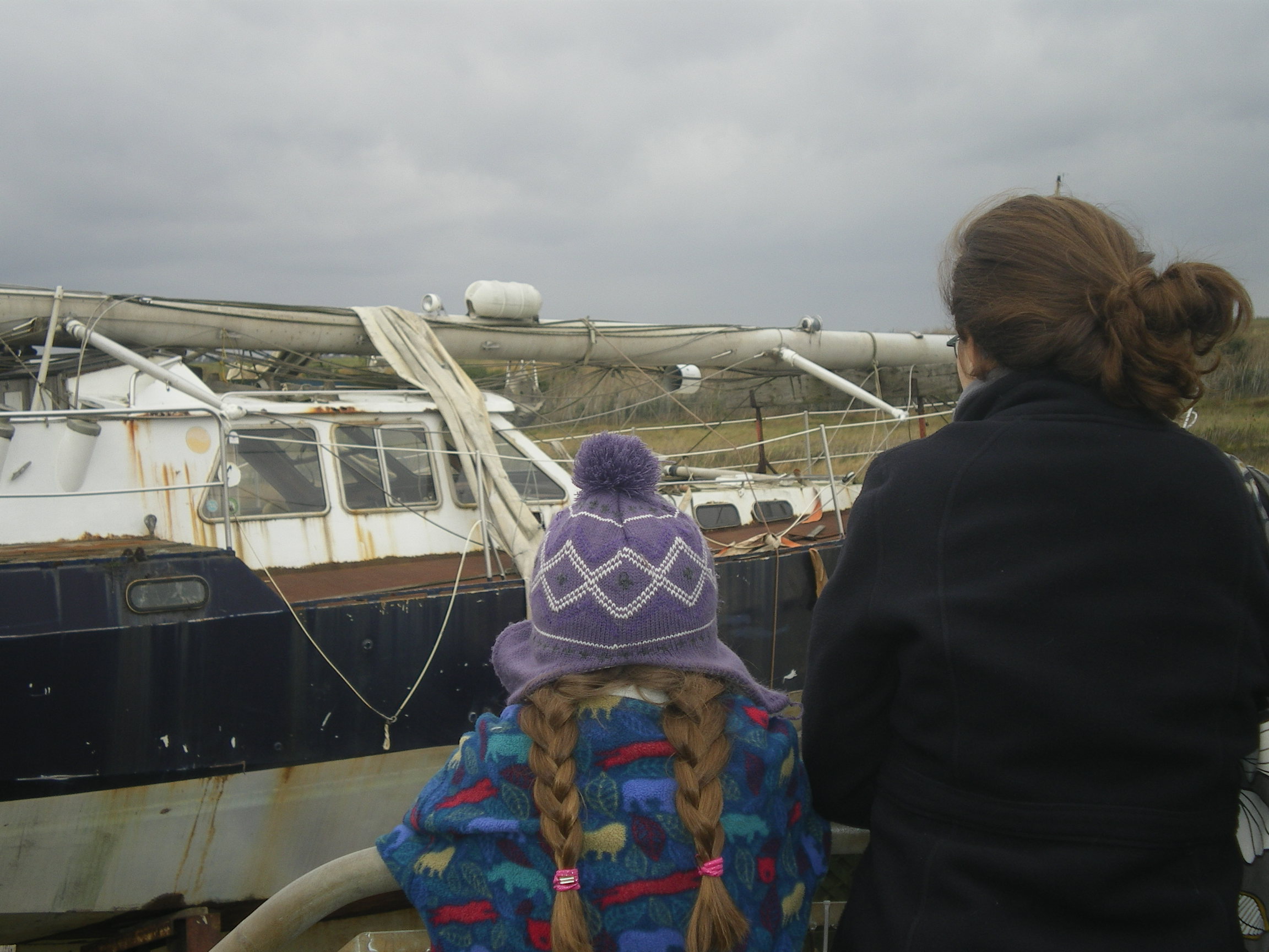 Boats in the mud at Canvey Island, Essex: the girls were 9 and 12 and 